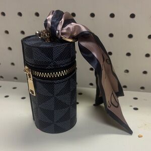Elegant Black Cylinder Bag with Scarf Accent